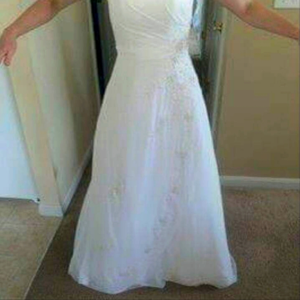 NWT never worn or altered David's Bridal A-line wedding gown